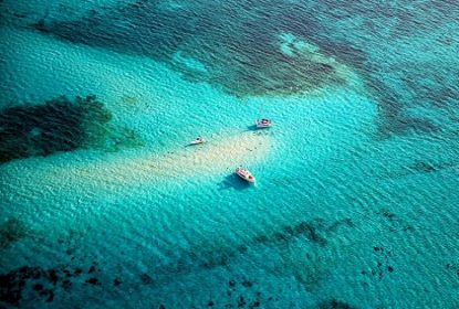 Cayo Hueso, Belice y Gran Caimán